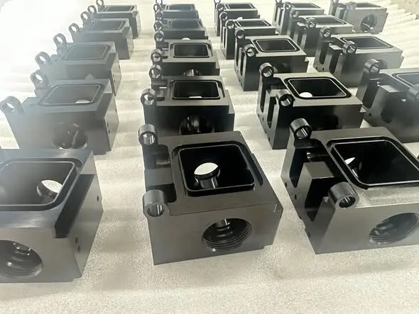 Batch of finished black precision housings