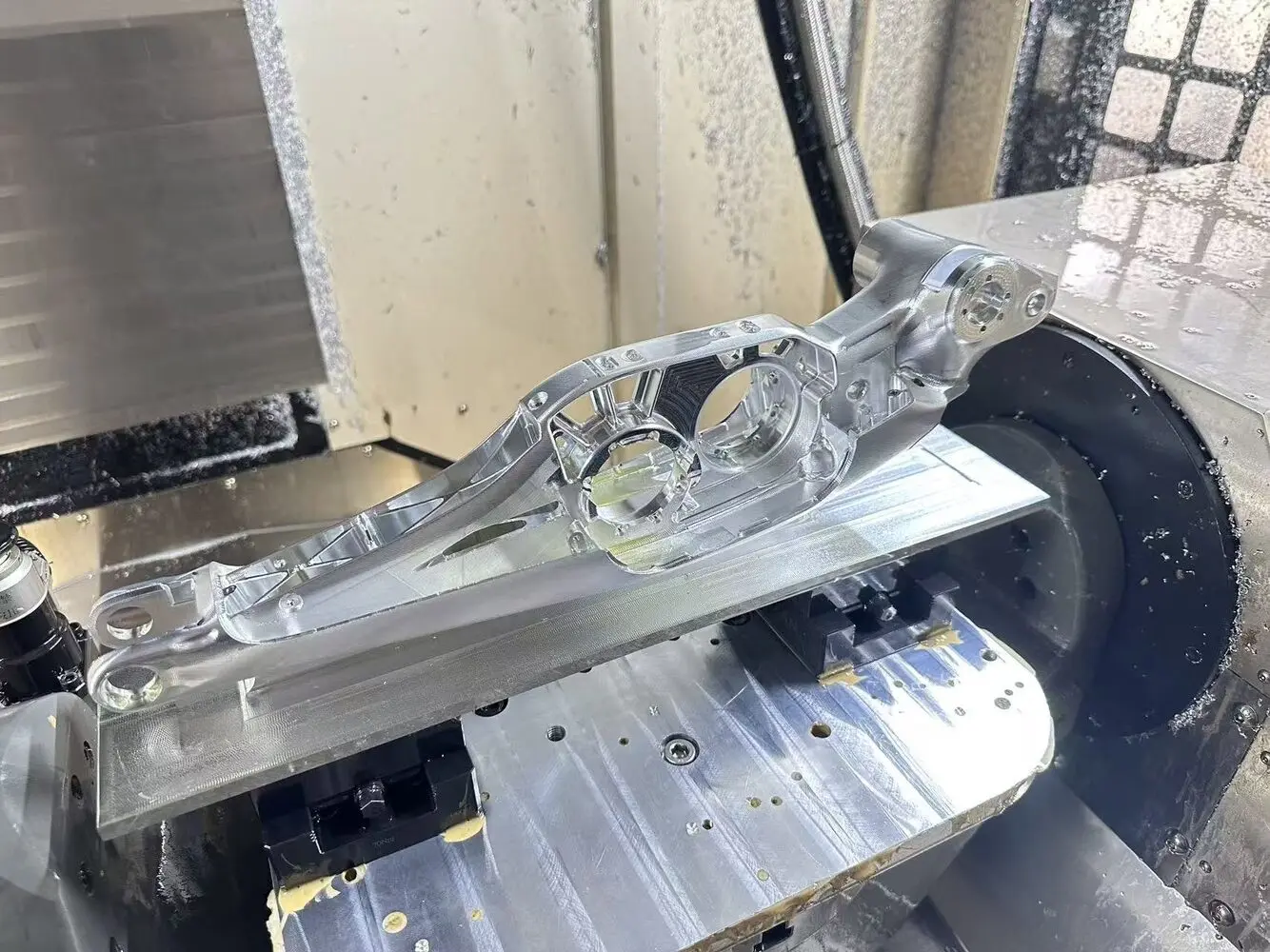 Complex aluminum automotive component on a CNC fixture